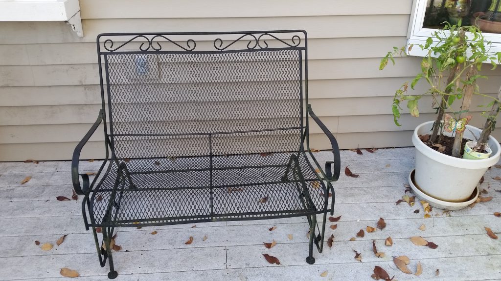 Metal Bench Glider on a deck