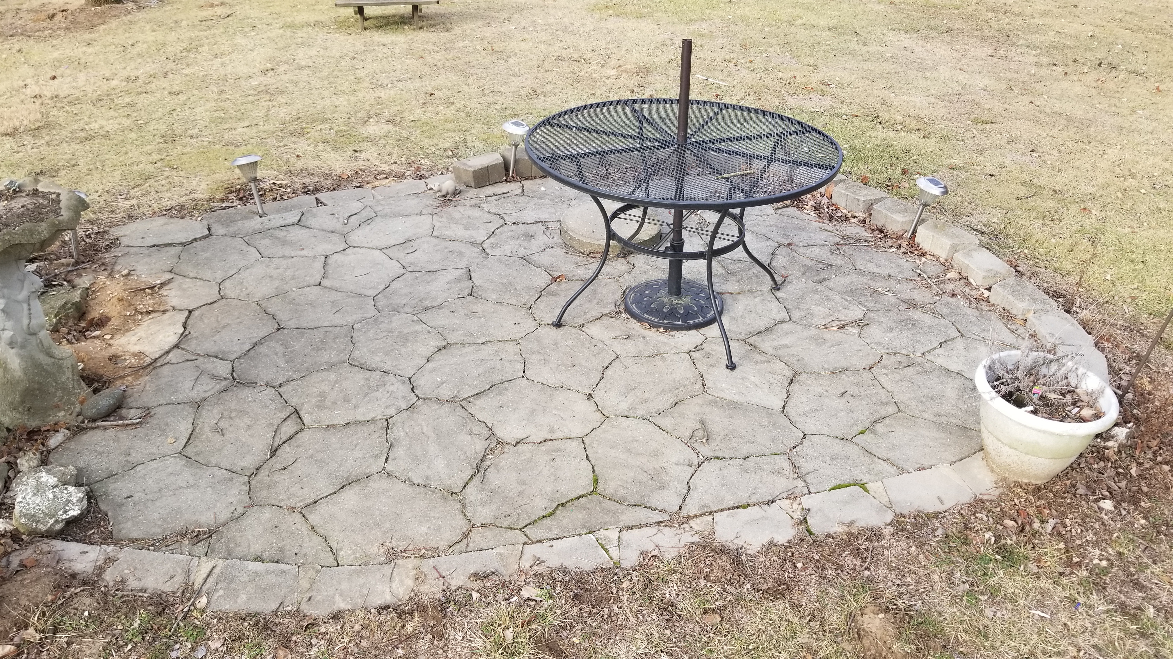 Small oval patio with paver stones