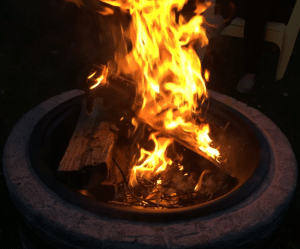 Sun Joe fire pit fire at night