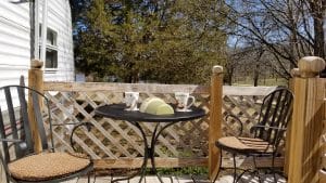 Wrought iron bistro set at the lake