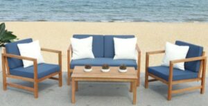 Safavieh Montez natural wood blue cushions and white throw pillows