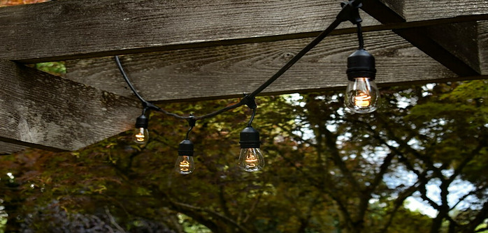 Overhead string lights for patio dining